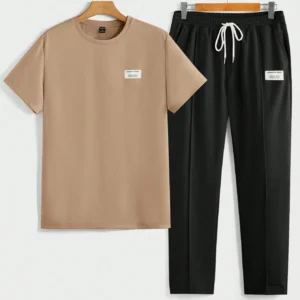 Manfinity VCAY مجموعة من قطعتين للرجال: تي شيرت كاجوال بأكمام قصيرة وياقة دائرية مع رقعة قماشية، وبنطلون متوسط الخصر بسحاب للربط، من قماش جيرسيه مريح للاستخدام اليومي