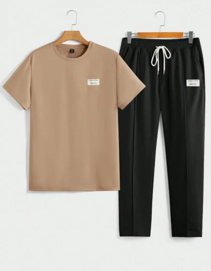 Manfinity VCAY مجموعة من قطعتين للرجال: تي شيرت كاجوال بأكمام قصيرة وياقة دائرية مع رقعة قماشية، وبنطلون متوسط الخصر بسحاب للربط، من قماش جيرسيه مريح للاستخدام اليومي